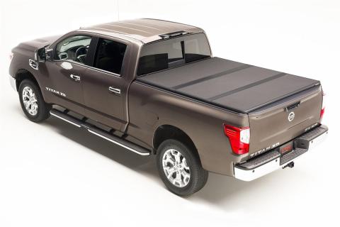 Solid Fold 2.0 Tonneau Cover Black Textured Paint 2005-2021 Nissan Frontier 4' 11 inch Bed with Factory Bed Rail Caps Extang