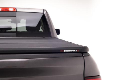 Solid Fold 2.0 Tonneau Cover Black Textured Paint 2009-2018 (2019-2024 Classic) Ram 5' 7 inch Bed without RamBox Extang