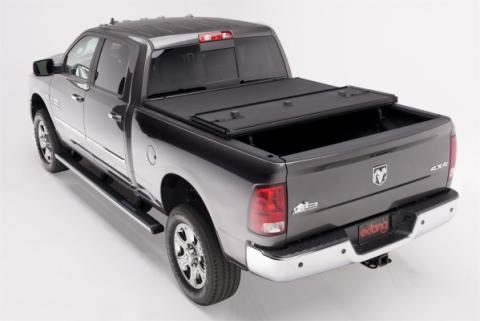 Solid Fold 2.0 Tonneau Cover Black Textured Paint 2009-2018 (2019-2024 Classic) Ram 5' 7 inch Bed without RamBox Extang