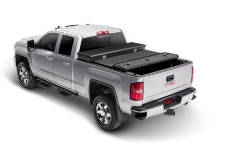 Solid Fold 2.0 Tool Box Tonneau Cover Black Textured Paint For Use w/Existing Tool Box Tool Box Not Included 2017-2026 Ford F-250/350 6' 10 inch Bed Extang