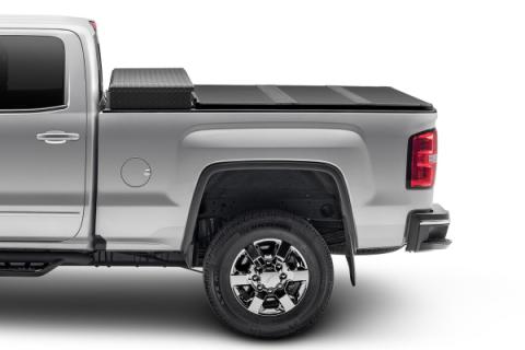 Solid Fold 2.0 Tool Box Tonneau Cover Black Textured Paint For Use w/Existing Tool Box Tool Box Not Included 2020-2026 Silverado/Sierra 2500 HD/3500 HD 6' 9 inch Bed without Factory Side Storage Boxes Extang