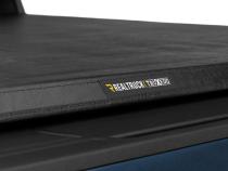 TruXport Tonneau Cover Black 2020-2026 Silverado/Sierra 2500 HD/3500 HD 6 Foot 9 Inch Bed Truxedo
