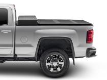 Solid Fold 2.0 Tool Box Tonneau Cover Black Textured Paint For Use w/Existing Tool Box Tool Box Not Included 2007-2013 Silverado/Sierra 1500/2007-2014 2500 HD/3500 HD 6' 6 inch Bed without Cargo Management System Extang