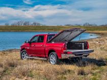 Tonneau Cover Elite LX 2009-2018 (2019-2023 Classic) Ram 1500/2010-2023 2500/3500 6 Foot 4 Inch Bed Std/Quad/Mega With Single Rear Wheels Without RamBox Brilliant Black UnderCover